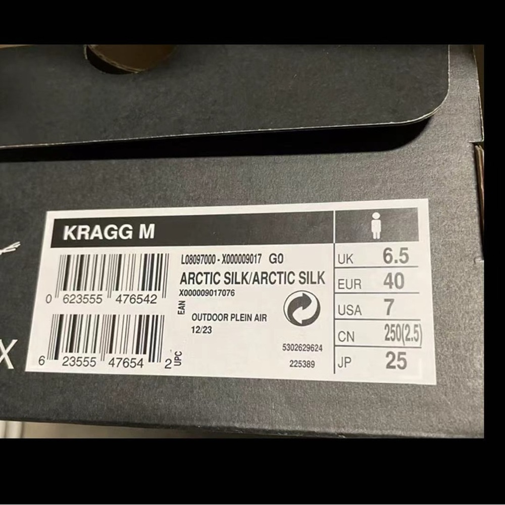 Arc'teryx Black and Silver Logo Display